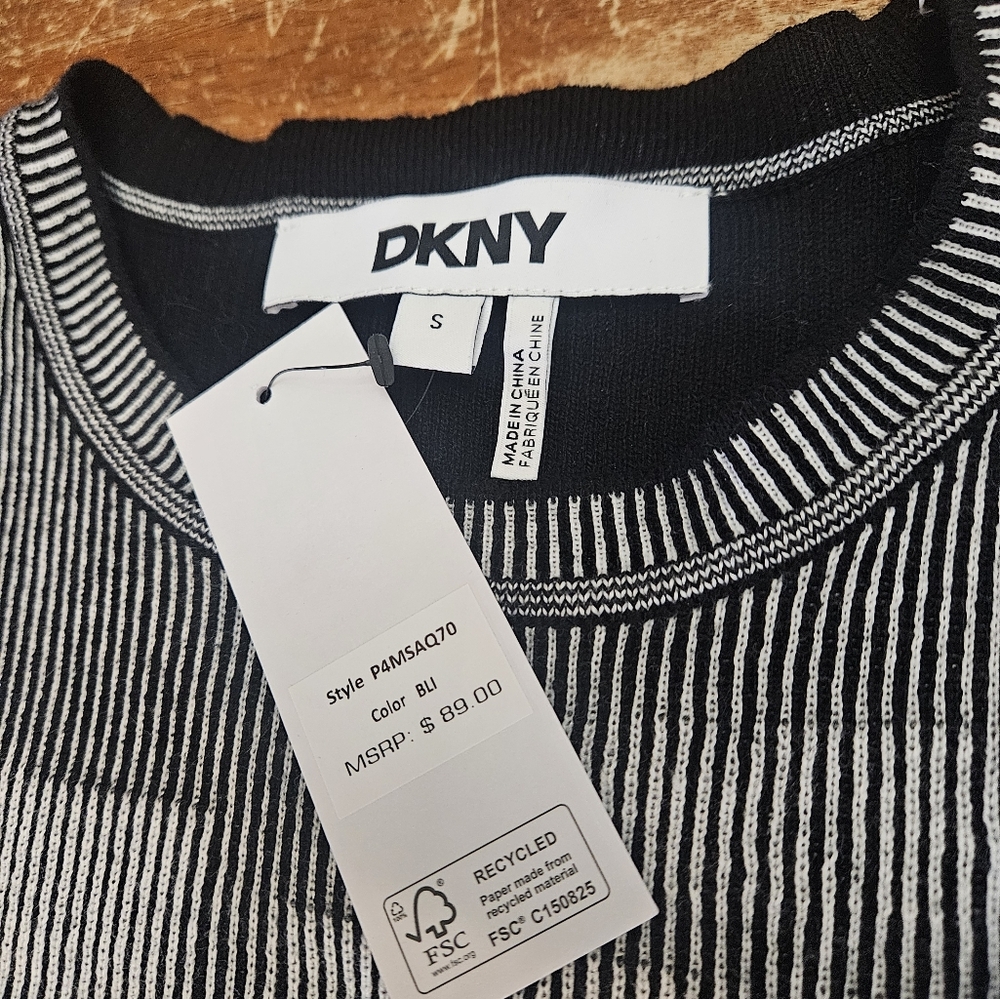 DKNY Womens Long Sleeve shirt. Size Slong sleeve. New Tags On. Never worn